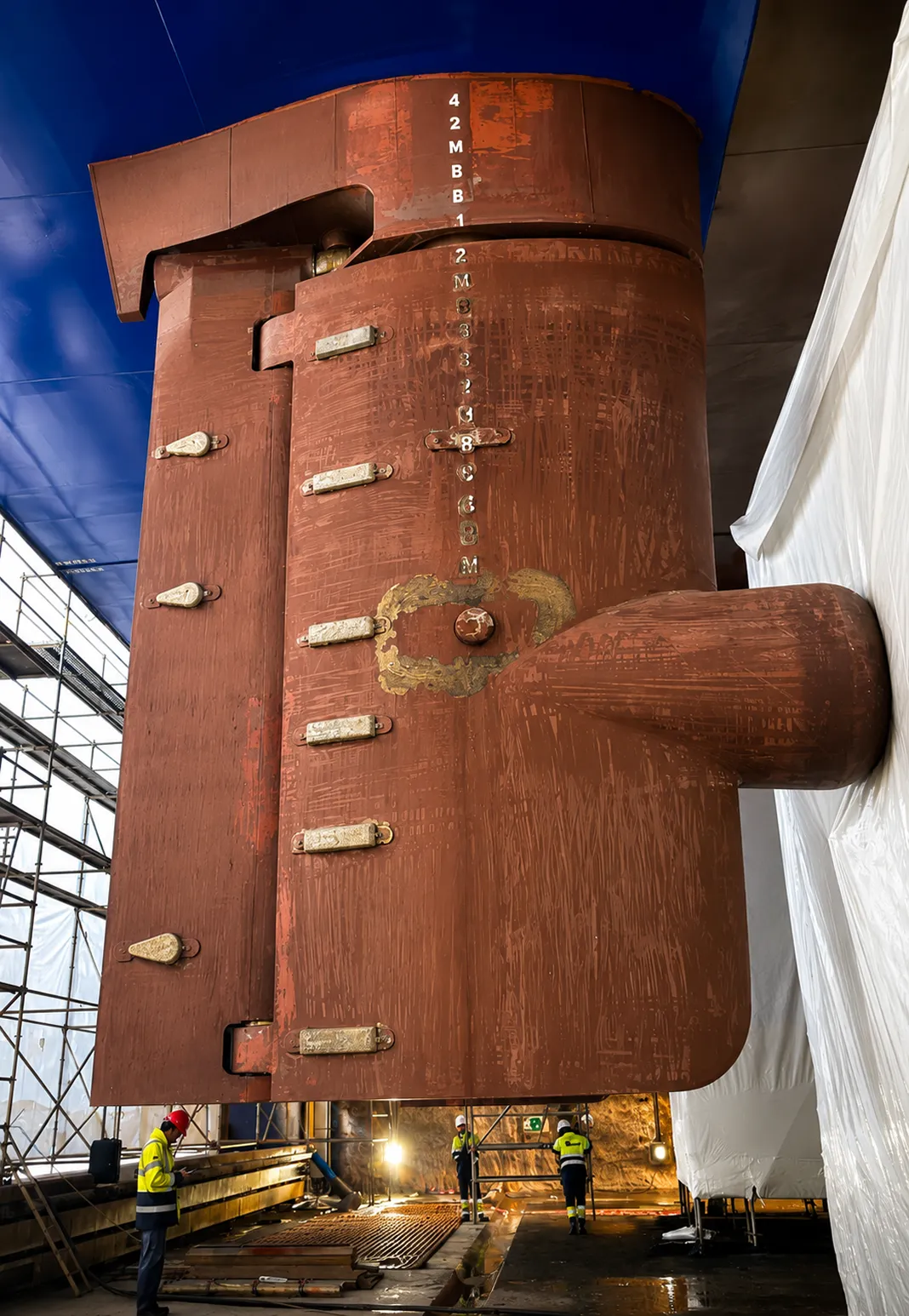 Full-spade rudder with propulsion bulb on a vessel hull in dry dock
